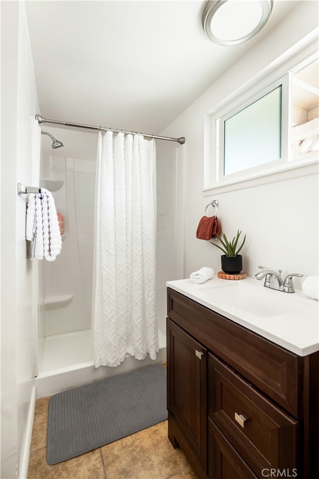 72994 Homestead Dr Unit 29, Palms, CA 92277 - bathroom featuring vanity, tile patterned floors, and shower / bath combo