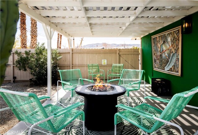 72994 Homestead Dr Unit 29, Palms, CA 92277 - fenced backyard featuring a fire pit and a patio area