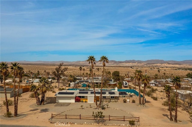 72994 Homestead Dr Unit 29, Palms, CA 92277 - drone / aerial view of a mountainous background and a pool area