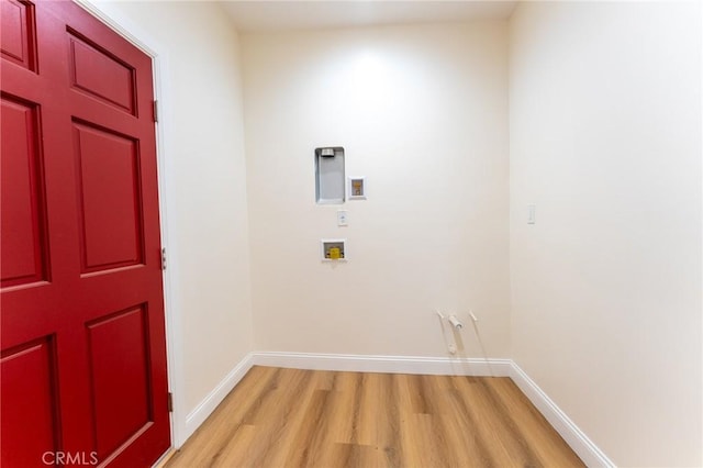 1532 W 22nd St, Los Angeles, CA 90007 - washroom with light wood-style floors and washer hookup