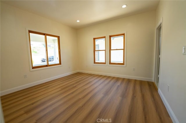 1532 W 22nd St, Los Angeles, CA 90007 - empty room featuring wood finished floors, recessed lighting, and baseboards