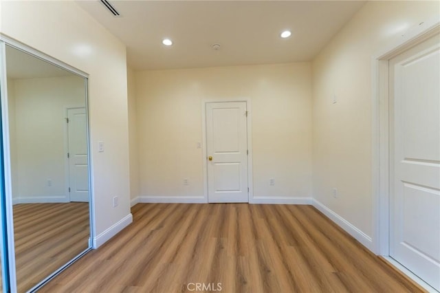 1532 W 22nd St, Los Angeles, CA 90007 - unfurnished room featuring light wood-type flooring, recessed lighting, and baseboards