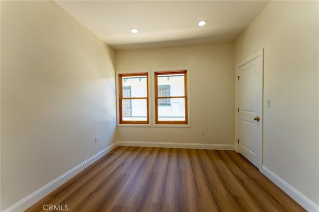 1532 W 22nd St, Los Angeles, CA 90007 - spare room featuring wood finished floors and recessed lighting