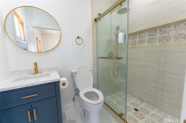 1532 W 22nd St, Los Angeles, CA 90007 - full bathroom featuring a stall shower, vanity, toilet, and baseboards