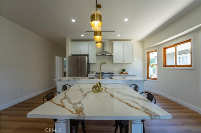 1532 W 22nd St, Los Angeles, CA 90007 - dining room with recessed lighting and dark wood-style flooring