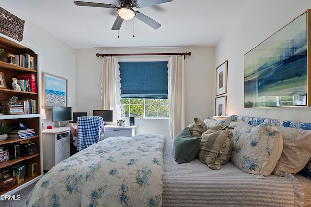 carpeted bedroom with a ceiling fan