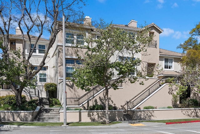 view of property with stairway