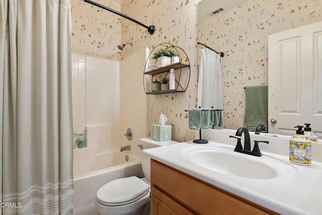 bathroom featuring shower / bath combination with curtain, vanity, visible vents, toilet, and wallpapered walls