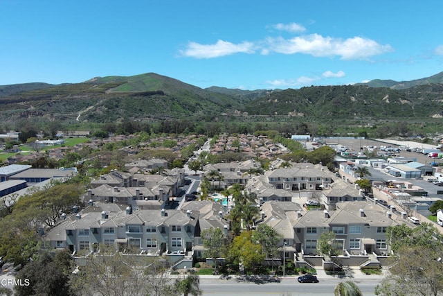 drone / aerial view featuring a mountain view and a residential view