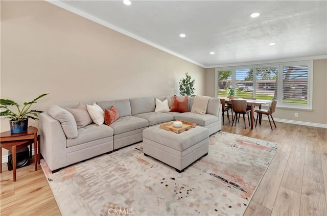 13110 Seaview Ln Unit 245F, Seal Beach, CA 90740 - living room with crown molding, light wood-style floors, and recessed lighting