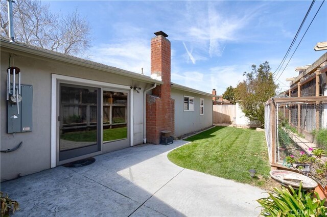 view of yard featuring a fenced backyard and a patio area