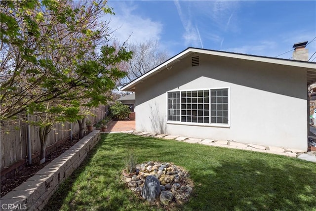 508 Launa Ln, Arroyo Grande, CA 93420 - view of side of property featuring stucco siding and a chimney