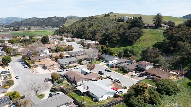 drone / aerial view with a mountain view and a residential view