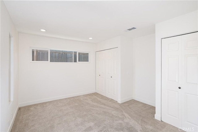 508 Launa Ln, Arroyo Grande, CA 93420 - unfurnished bedroom featuring carpet, two closets, recessed lighting, and baseboards