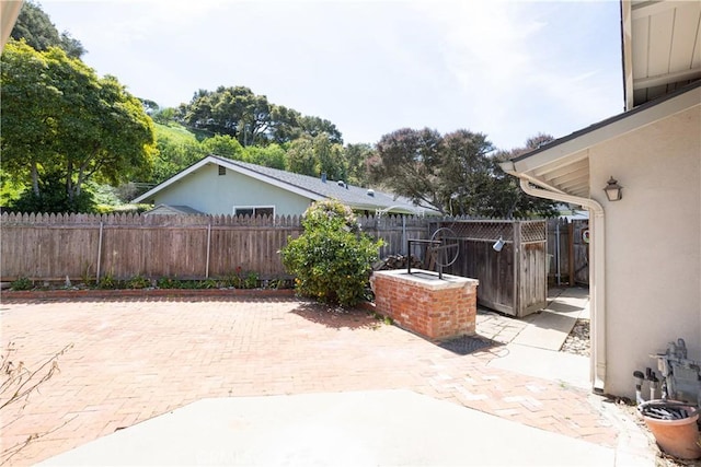 view of patio with fence