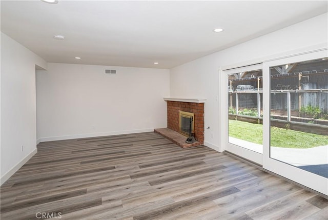 508 Launa Ln, Arroyo Grande, CA 93420 - unfurnished living room featuring wood finished floors, recessed lighting, a fireplace, and baseboards