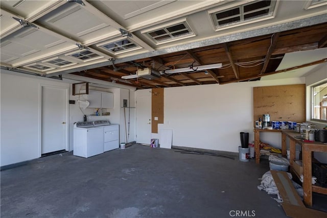 garage with washer and dryer