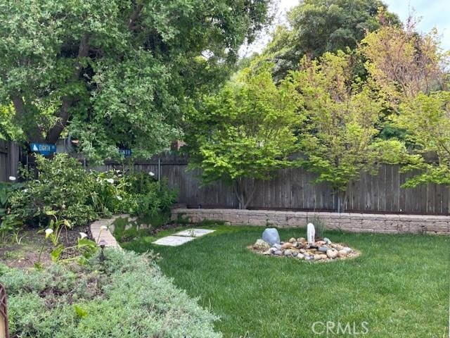 view of yard featuring fence