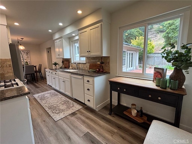 508 Launa Ln, Arroyo Grande, CA 93420 - kitchen with dishwashing machine, a sink, plenty of natural light, backsplash, and recessed lighting