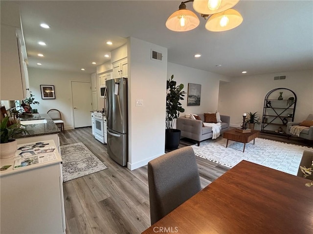 508 Launa Ln, Arroyo Grande, CA 93420 - dining area with wood finished floors, recessed lighting, and baseboards