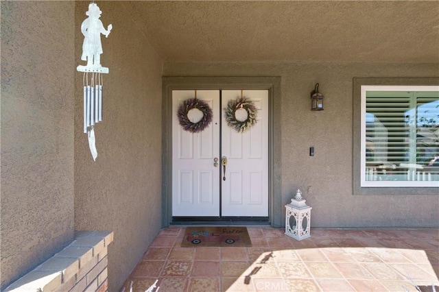 27089 Adelanto Dr, Corona, CA 92883 - view of exterior entry featuring stucco siding
