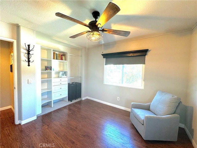 27089 Adelanto Dr, Corona, CA 92883 - sitting room with a ceiling fan, baseboards, a textured ceiling, and dark wood finished floors