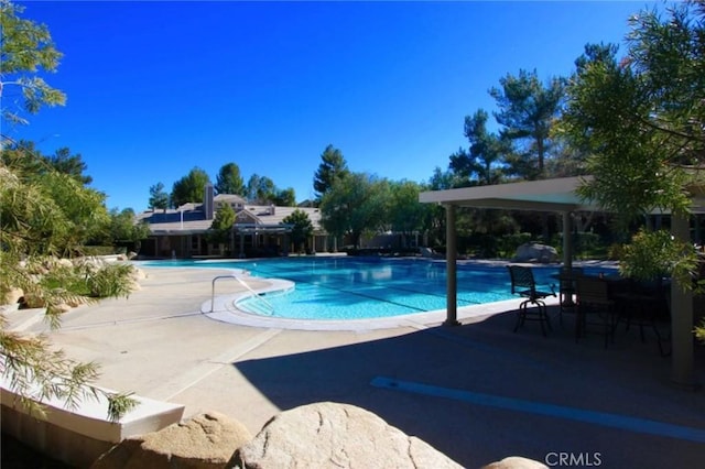 27089 Adelanto Dr, Corona, CA 92883 - pool featuring a patio area