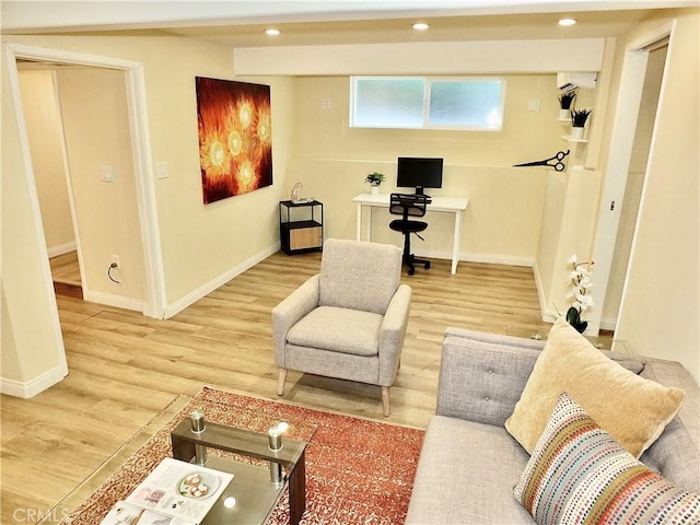 220 Roycroft Ave, Long Beach, CA 90803 - living area featuring wood finished floors, recessed lighting, a wall mounted air conditioner, and an office area