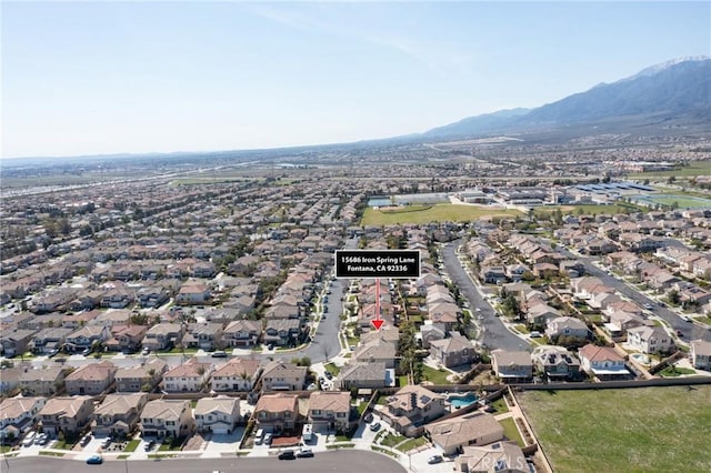 15686 Iron Spring Ln, Fontana, CA 92336 - view of property location with nearby suburban area and a mountainous background