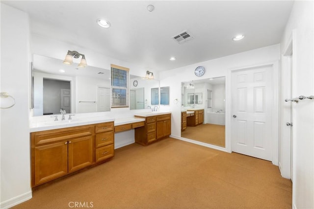 15686 Iron Spring Ln, Fontana, CA 92336 - bathroom featuring two vanities and recessed lighting