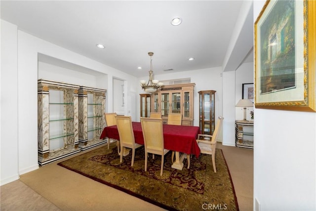 15686 Iron Spring Ln, Fontana, CA 92336 - dining space with a chandelier, recessed lighting, and carpet