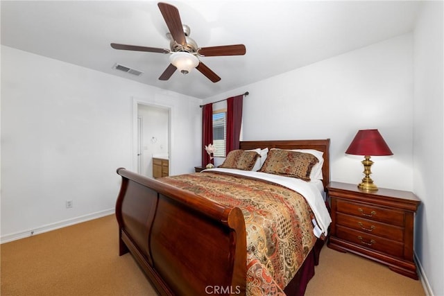 15686 Iron Spring Ln, Fontana, CA 92336 - bedroom with light colored carpet, connected bathroom, and ceiling fan