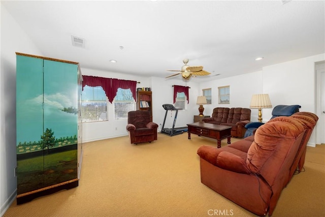 15686 Iron Spring Ln, Fontana, CA 92336 - carpeted living area featuring a ceiling fan and recessed lighting