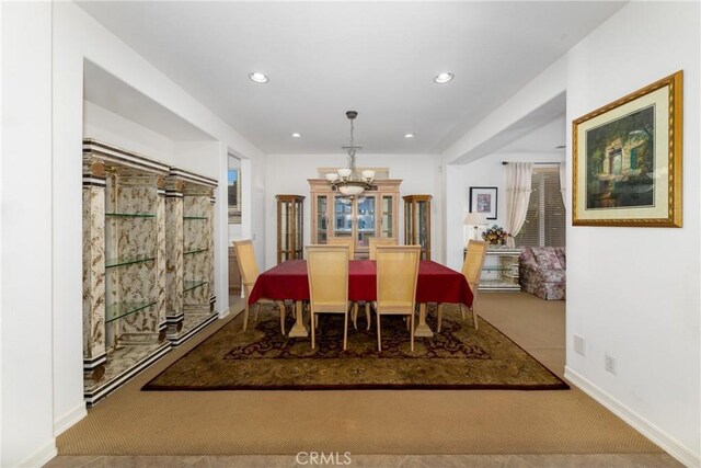 15686 Iron Spring Ln, Fontana, CA 92336 - carpeted dining room with a chandelier and recessed lighting
