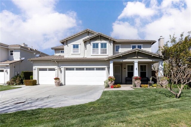 15686 Iron Spring Ln, Fontana, CA 92336 - craftsman inspired home featuring stucco siding, driveway, a porch, a front lawn, and a garage