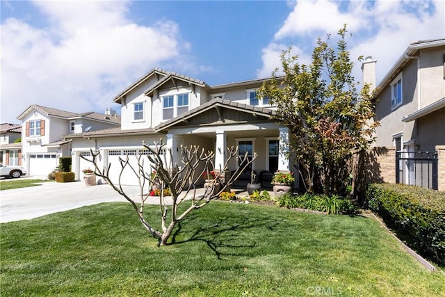 15686 Iron Spring Ln, Fontana, CA 92336 - craftsman-style house featuring a garage, covered porch, driveway, stucco siding, and a residential view