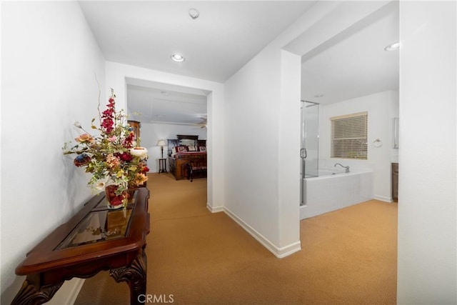 15686 Iron Spring Ln, Fontana, CA 92336 - hallway with carpet floors and recessed lighting