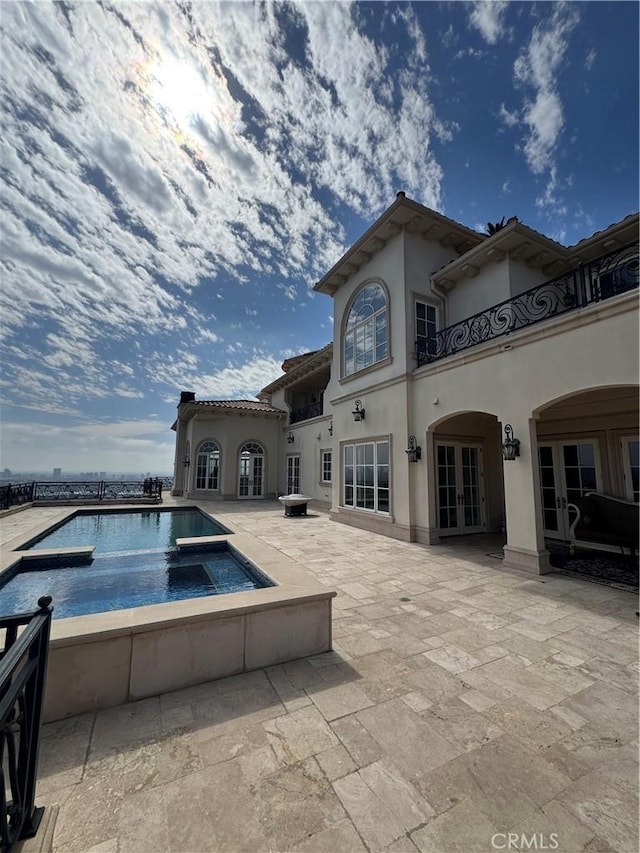 2025 E Live Oak Dr, Los Angeles, CA 90068 - pool with french doors and a patio area