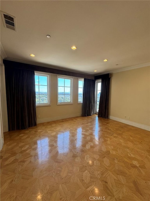 2025 E Live Oak Dr, Los Angeles, CA 90068 - unfurnished room featuring baseboards, visible vents, ornamental molding, and a healthy amount of sunlight