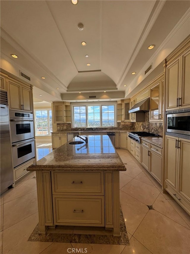 2025 E Live Oak Dr, Los Angeles, CA 90068 - kitchen featuring a kitchen island, a raised ceiling, open shelves, wall chimney range hood, and built in appliances