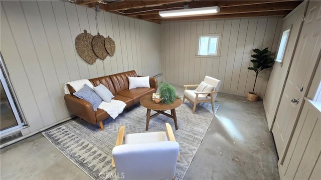 living room with concrete flooring
