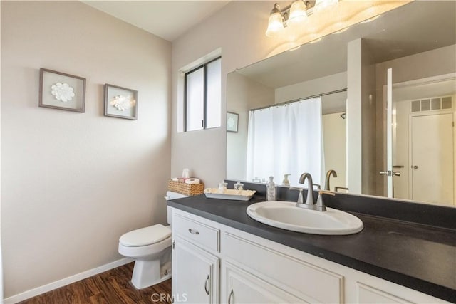 full bathroom with wood finished floors, vanity, baseboards, toilet, and a shower with shower curtain