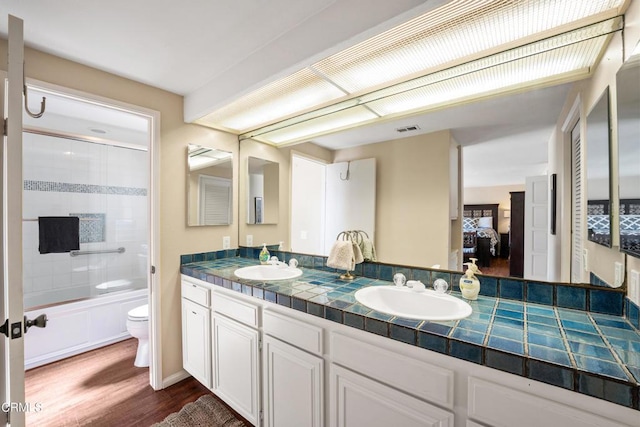 3371 Ocean Dr, Oxnard, CA 93035 - ensuite bathroom with toilet, a sink, visible vents, double vanity, and ensuite bathroom
