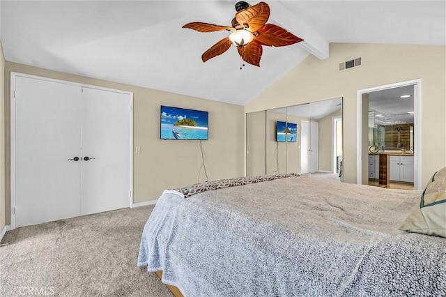 22839 Ridge Route Ln, Lake Forest, CA 92630 - carpeted bedroom featuring visible vents, vaulted ceiling with beams, baseboards, two closets, and ceiling fan
