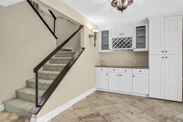 22839 Ridge Route Ln, Lake Forest, CA 92630 - bar with stairway, baseboards, and a dry bar