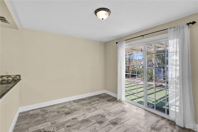 22839 Ridge Route Ln, Lake Forest, CA 92630 - unfurnished room with baseboards, wood finished floors, and visible vents