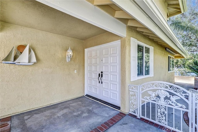 22839 Ridge Route Ln, Lake Forest, CA 92630 - view of exterior entry with stucco siding
