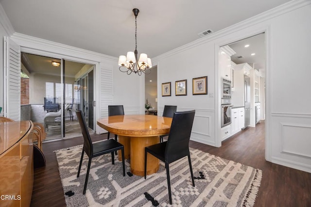 380 S Orange Grove Blvd Unit 6, Pasadena, CA 91105 - dining space with ornamental molding, a chandelier, dark wood-style flooring, a decorative wall, and wainscoting