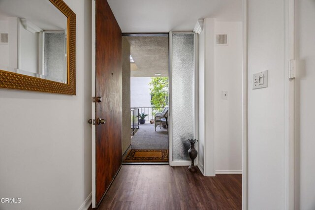 380 S Orange Grove Blvd Unit 6, Pasadena, CA 91105 - entryway featuring expansive windows and dark wood-style flooring