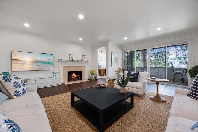380 S Orange Grove Blvd Unit 6, Pasadena, CA 91105 - living room featuring ornamental molding, wood finished floors, recessed lighting, and a warm lit fireplace